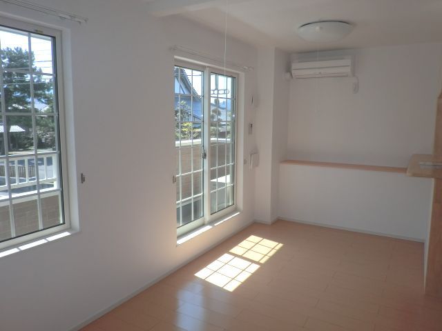 Living and room. Air conditioning is equipment.