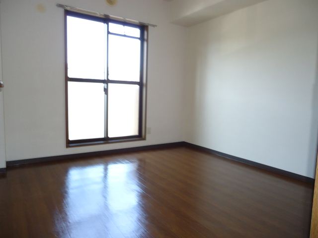 Living and room. There service balcony