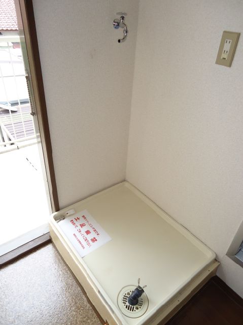 Entrance. Washing machine Storage