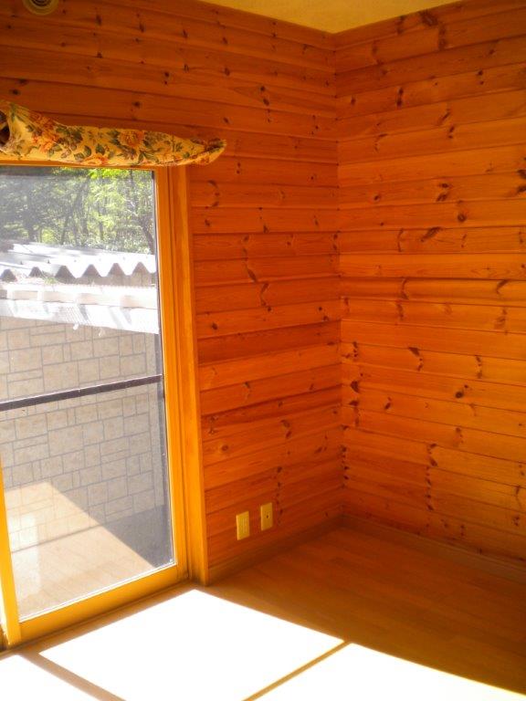 Living and room. The room inside is wood wall. 