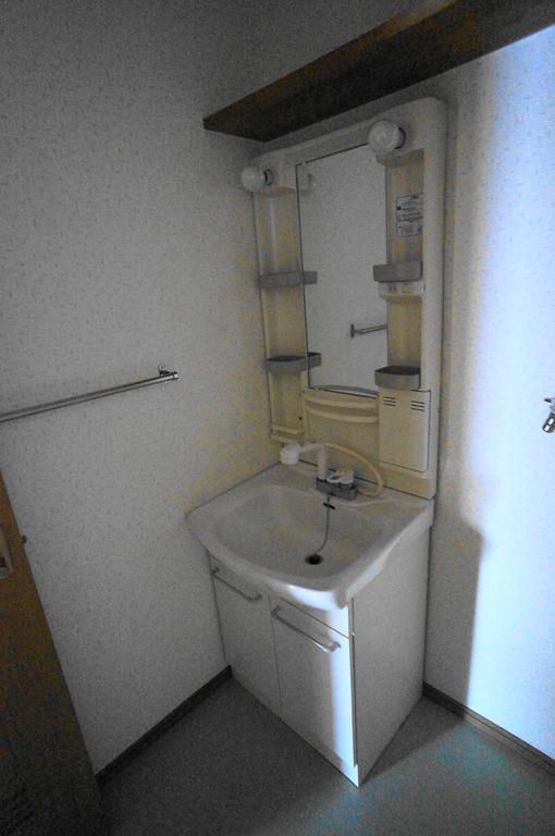 Washroom. There Shampoo dresser