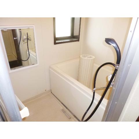 Bath. There is a window in the bathroom