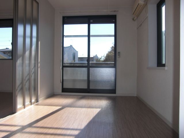 Living and room. Also good day in the large windows.