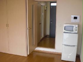 Living and room. refrigerator, It is with microwave