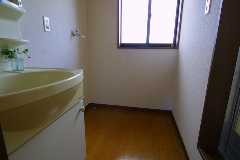 Washroom. Washing machine in the room