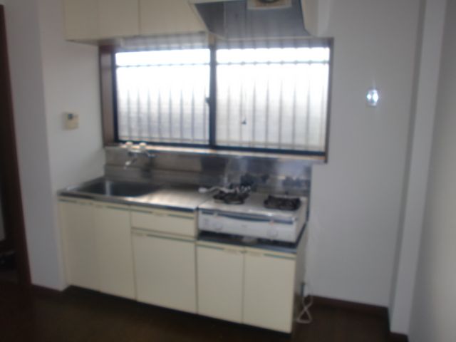 Kitchen. There is a window in the kitchen, Wind of the room is easily escape. 