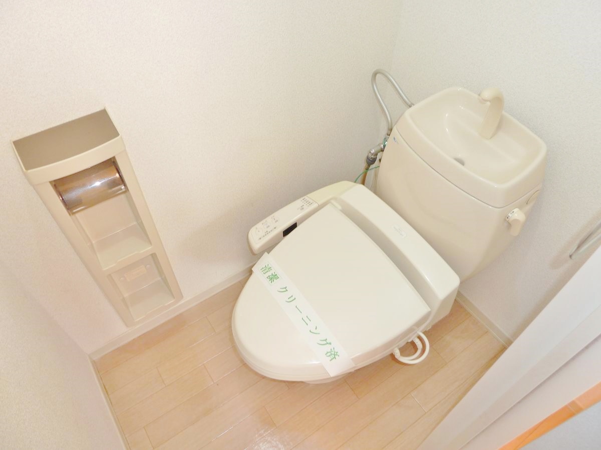 Toilet. Of course, it is warm water washing toilet seat.