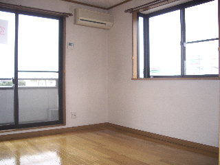 Living and room. Bay window is also a corner room of beautiful flooring with. 