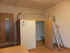 Living and room. Under the bed has become a walk-in closet.