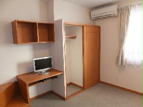 Living and room. It is with a LCD TV