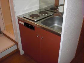 Kitchen. Two-burner stove is.