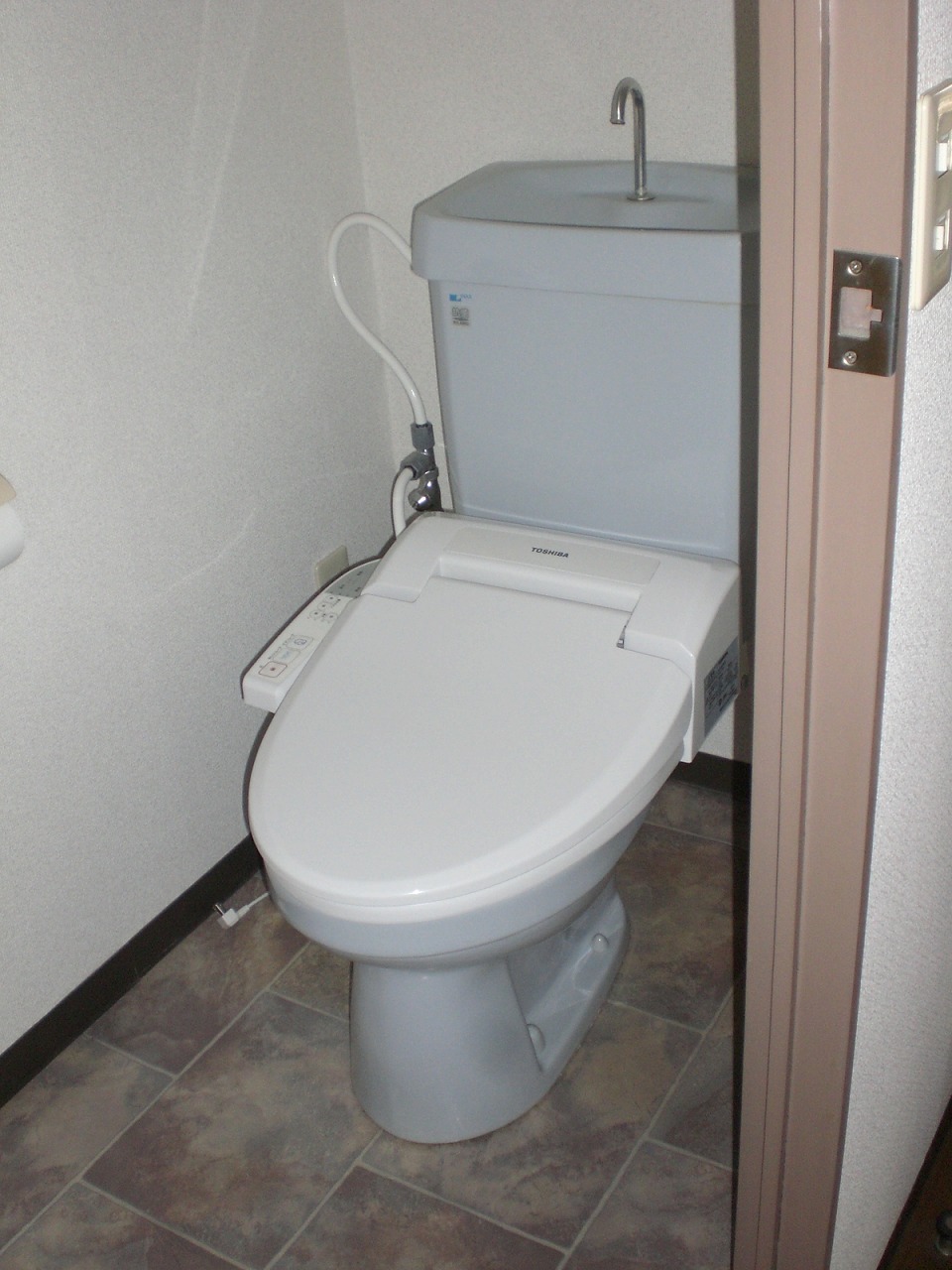 Toilet. Warm water washing toilet seat