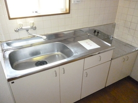 Kitchen. Bright has a window in the kitchen. 