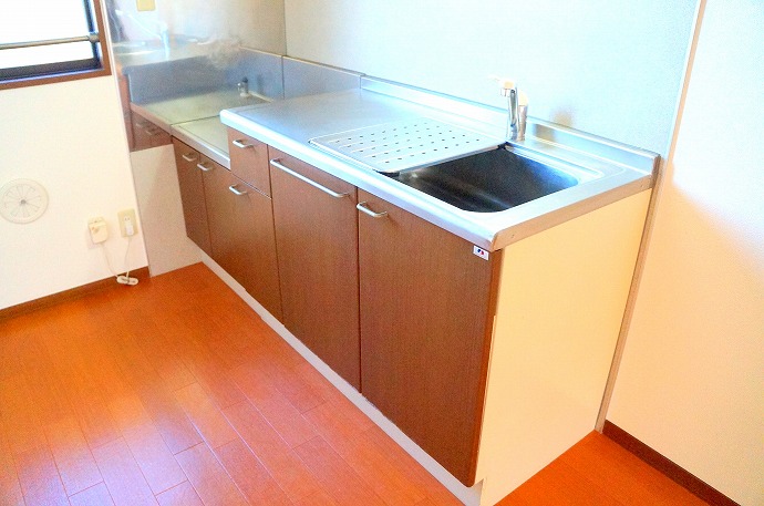 Kitchen. It is bright with a window