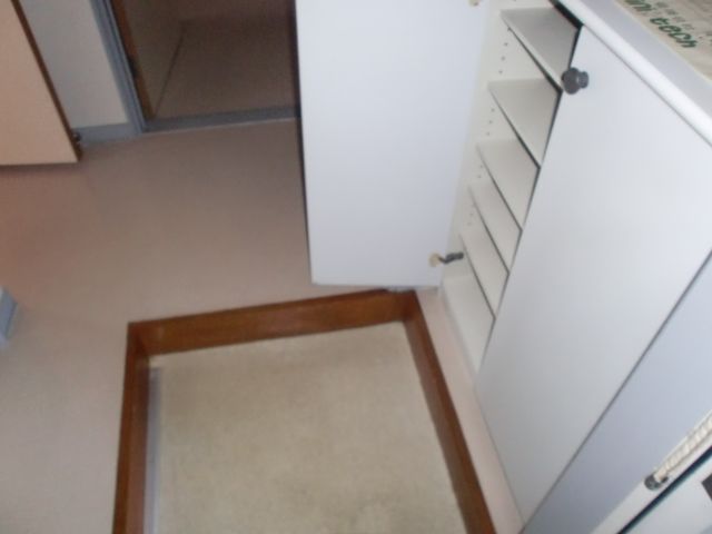 Entrance. Simple large shoebox of white.