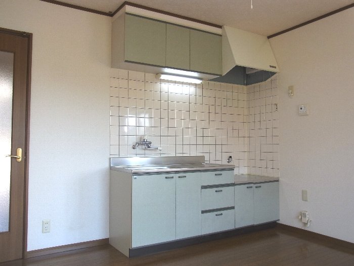 Kitchen. There is also a hanging cupboard