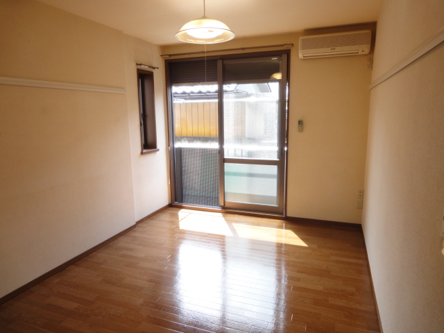 Living and room. South Western-style first floor is also equipped with shutters