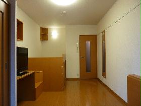 Living and room. From window side. There is a depth.