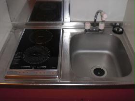 Kitchen. Two-burner stove is. 