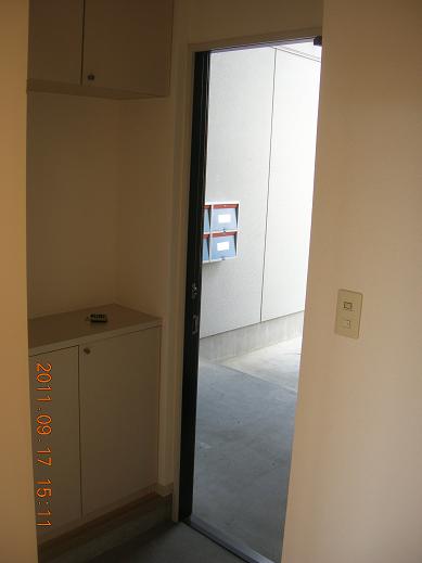 Entrance. Shoe box is located in the up and down. 