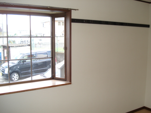 Other room space. Sunny since bay window is attached