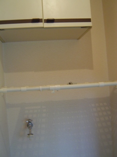 Receipt. There is a shelf of fitted on top of the washing machine Storage