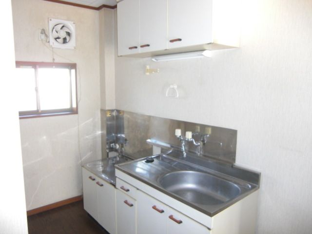 Kitchen. The kitchen has a window for ventilation, You can also ensure lighting. 