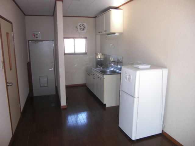 Living and room. It has been taken into account so that not see the kitchen from the front door. 