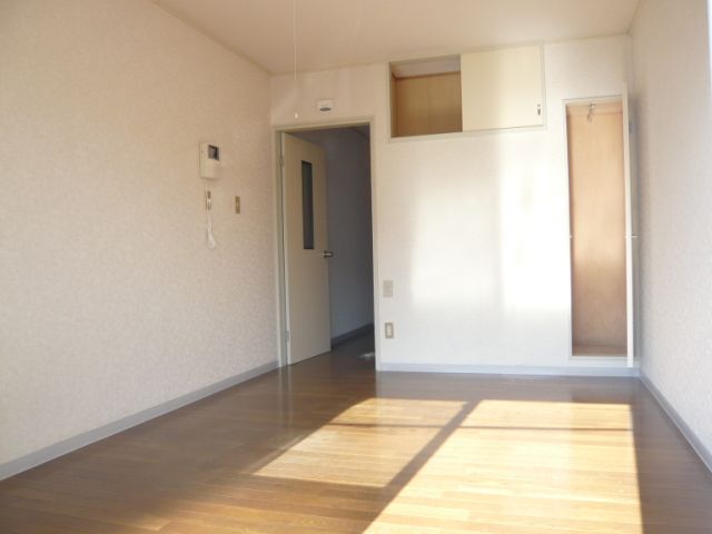 Living and room. Upper closet with storage plenty