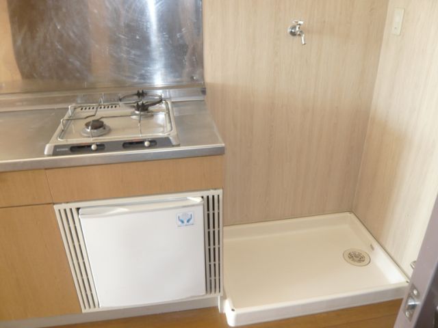 Other room space. Washing machine is not dirt in the washing machine storage room.