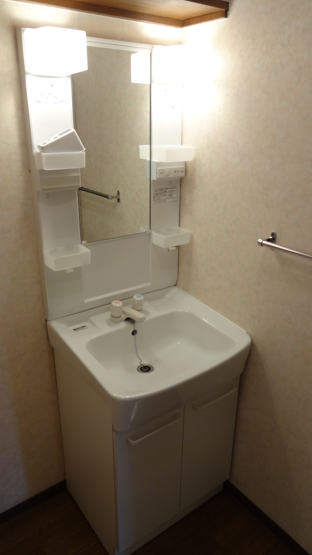 Washroom. Wash basin is with shower. 