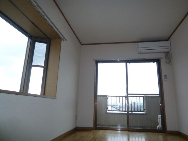 Living and room. Insert the bright sunlight from the two windows.