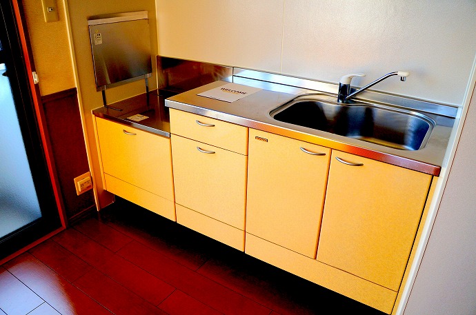 Kitchen. It is cute Nante yellow kitchen