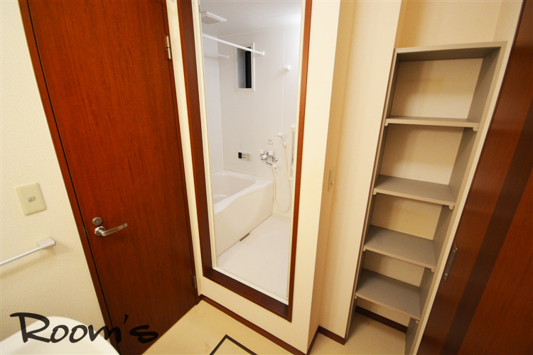 Washroom. Convenient shelf storage in the washroom back. 