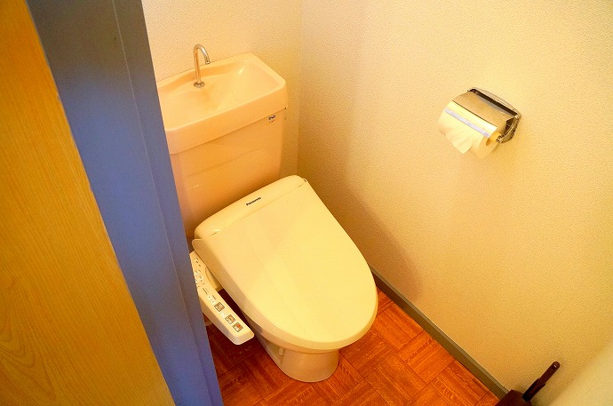 Toilet. Washlet comes