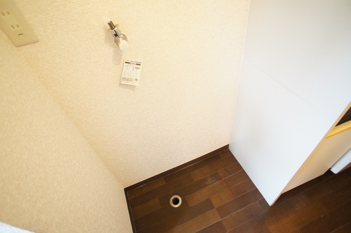 Other Equipment. Washing machine is put on in the room.