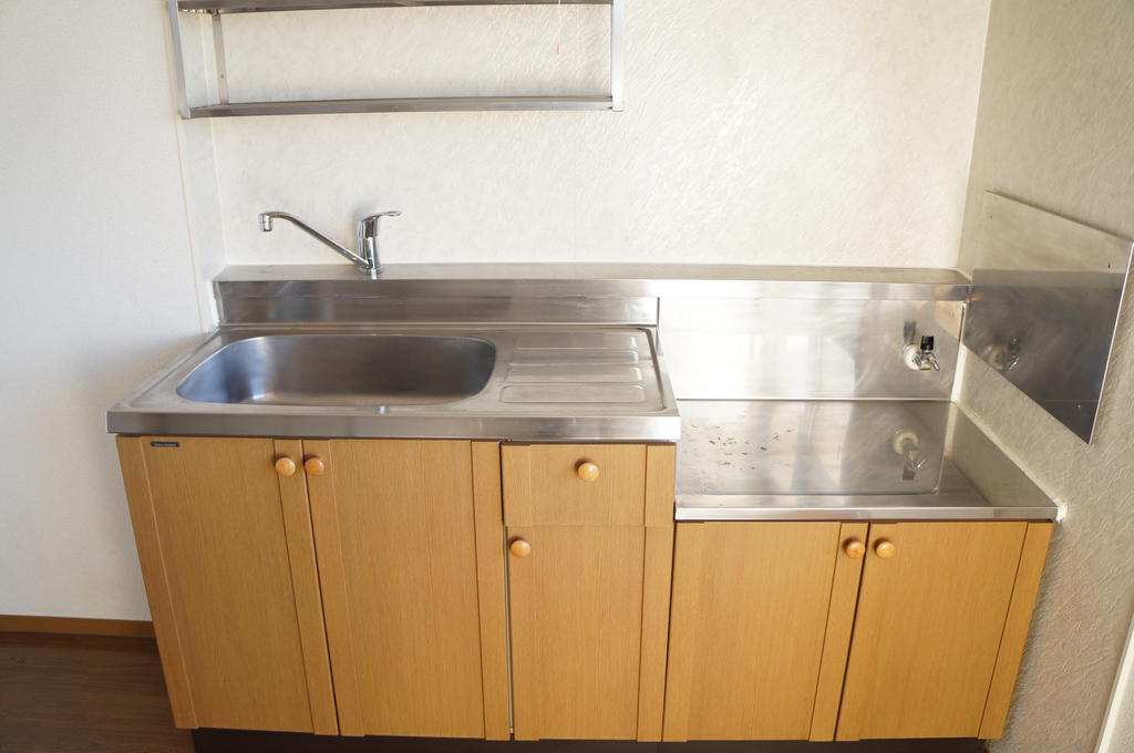 Kitchen. It is also a kitchen storage pat with hanging cupboard