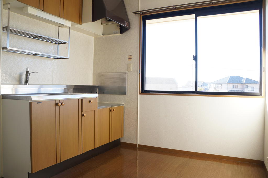 Kitchen. Bright kitchen with large windows