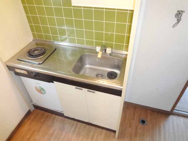 Kitchen. It is with a refrigerator! 