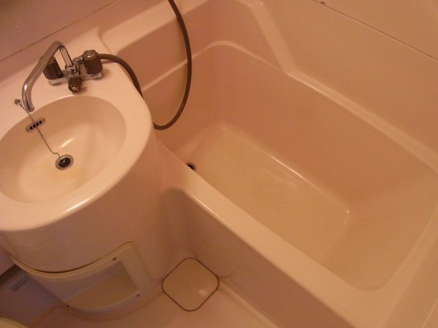 Bath. It is a bathroom with cleanliness