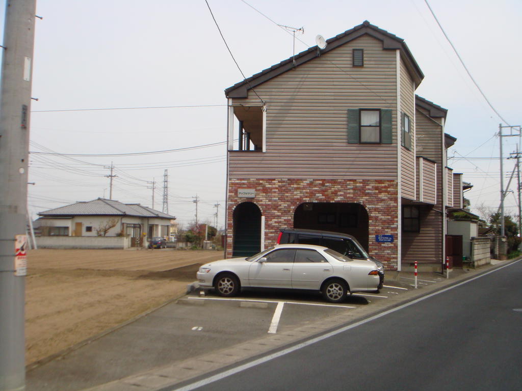 Parking lot. The building right next to the parking lot.