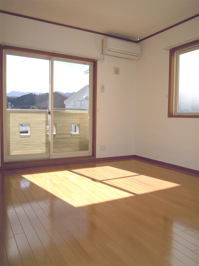 Living and room. Bright living room with with two windows. Air-conditioned. 