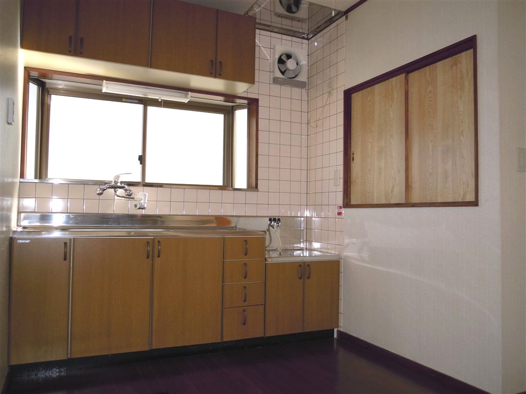 Kitchen. Bright kitchen window with a shelf glad of furnishing