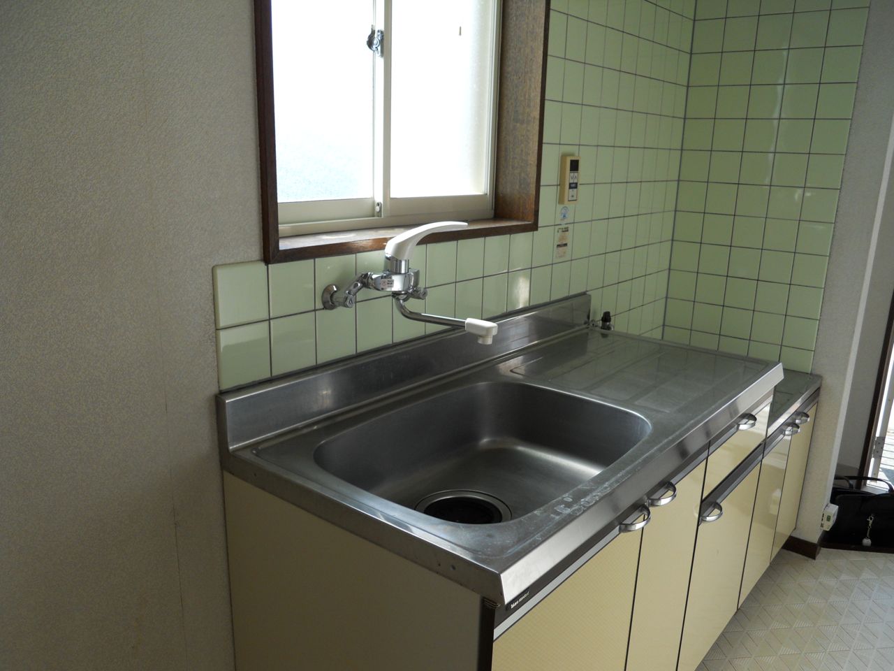 Kitchen. Because there is a window, Very bright