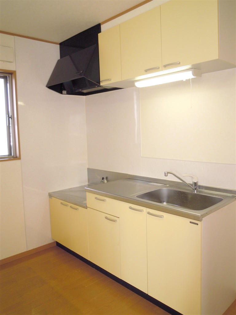 Kitchen. There is a window, Bright, cute kitchen