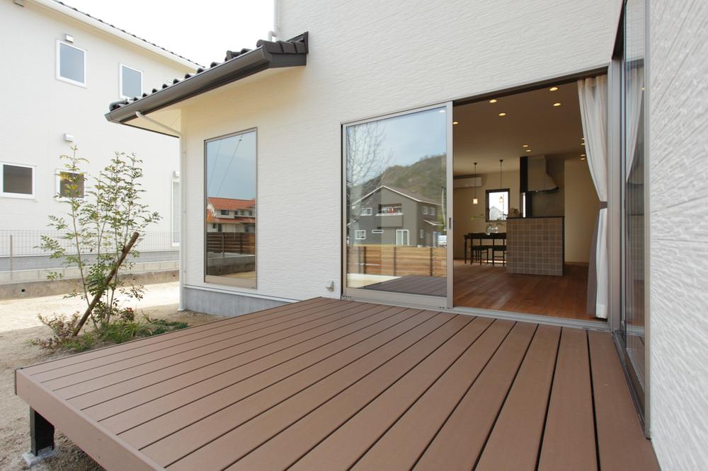 Model house photo.  [21-6] Wood deck