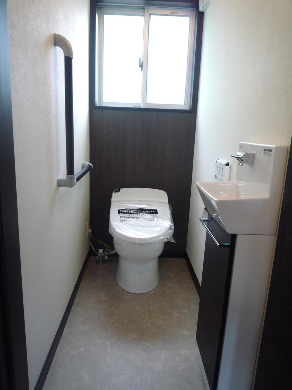 Toilet. Since tankless toilet, It feels a little spacious space.