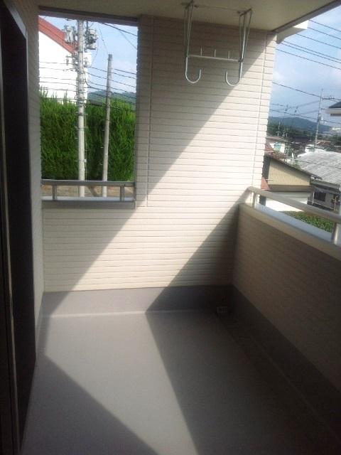 Balcony. It is safe in the sudden rain spacious because balcony roof.