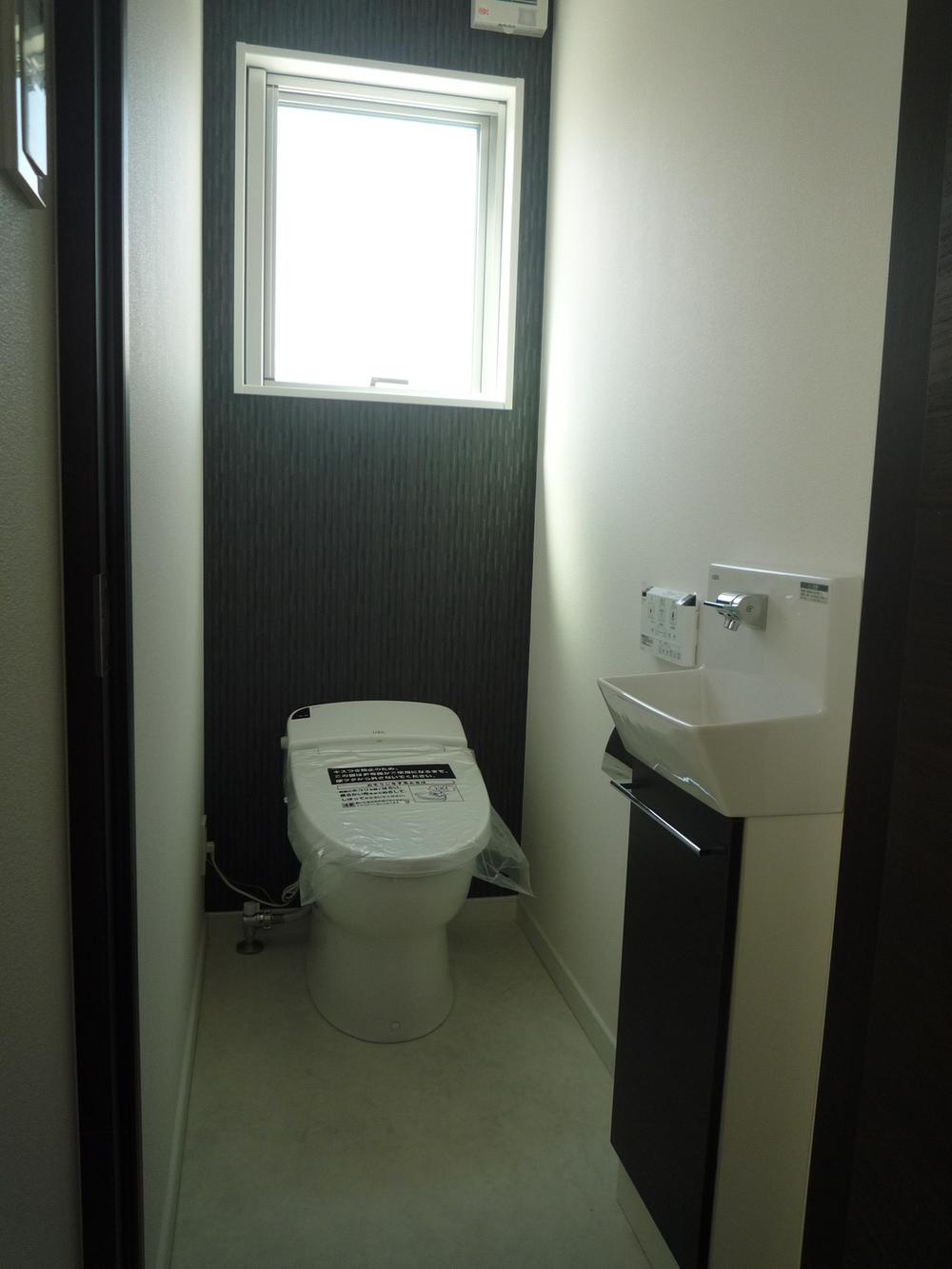 Other Equipment. Wash-basin in the tankless toilet. The window also attached to a bright toilet!