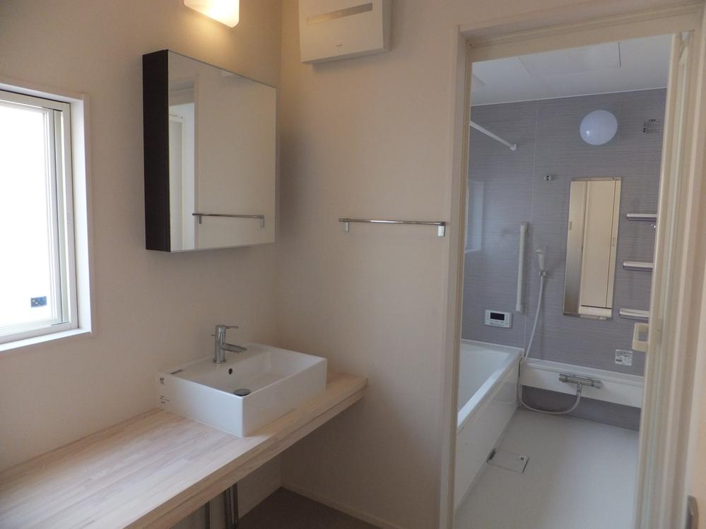 Bathroom. "Bathroom heating" is "ventilation", "cool breeze" bathroom with "clothes drying".